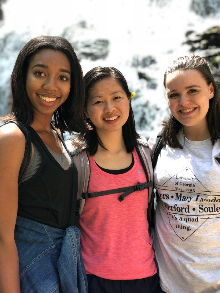 Amber, Jane, and Grace at the waterfall