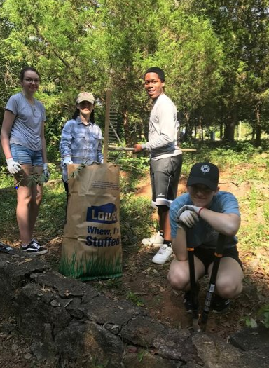 FRC members clean brush at Gospel Pilgrim